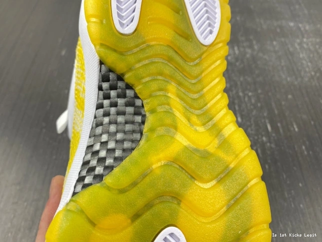 AH7860-107 Jordan Snakeskin Air 11 Low Yellow WMNS 0705